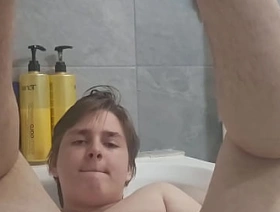 Chubby boy jerks off and cums in bathtub