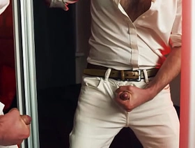 A handsome guy masturbates in front of a mirror. I finish loudly and fill the mirror with my sperm.