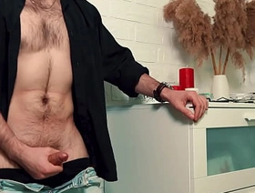 The handsome man jerks off on camera and cums loudly, splashing the floor with his sperm.